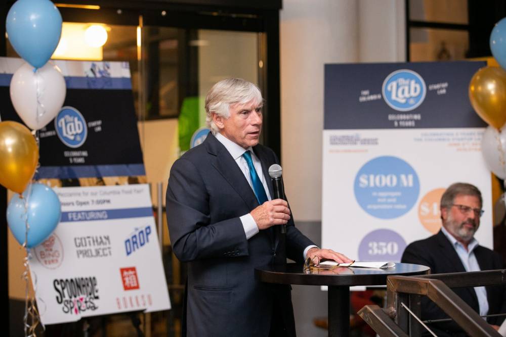 Columbia President Lee C. Bollinger celebrates the Columbia Startup Lab's 5 Year milestone at WeWork Soho West, as Columbia Entrepreneurship, Innovation and Design founder Richard Witten listens. Columbia University President Lee C. Bollinger speaks at the Lab's 5th anniversary event.