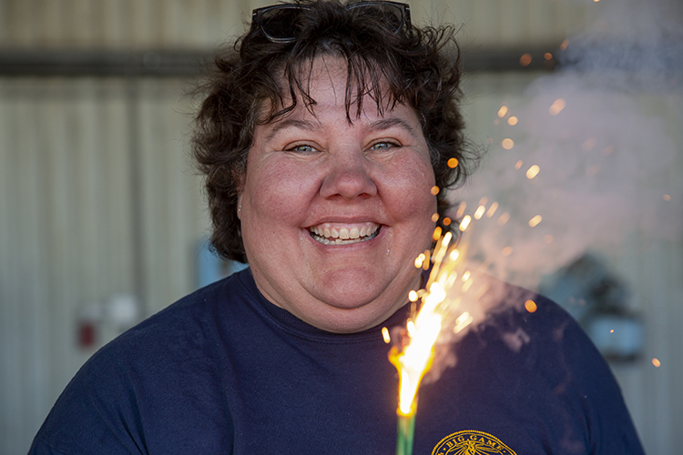 Maya Goehring-Harris oversees the cannon crew and works on fireworks crews on July 4