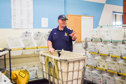 Mike working in the mail room