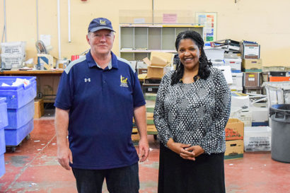 Mike Combs and Gia White stand side by side, smiling