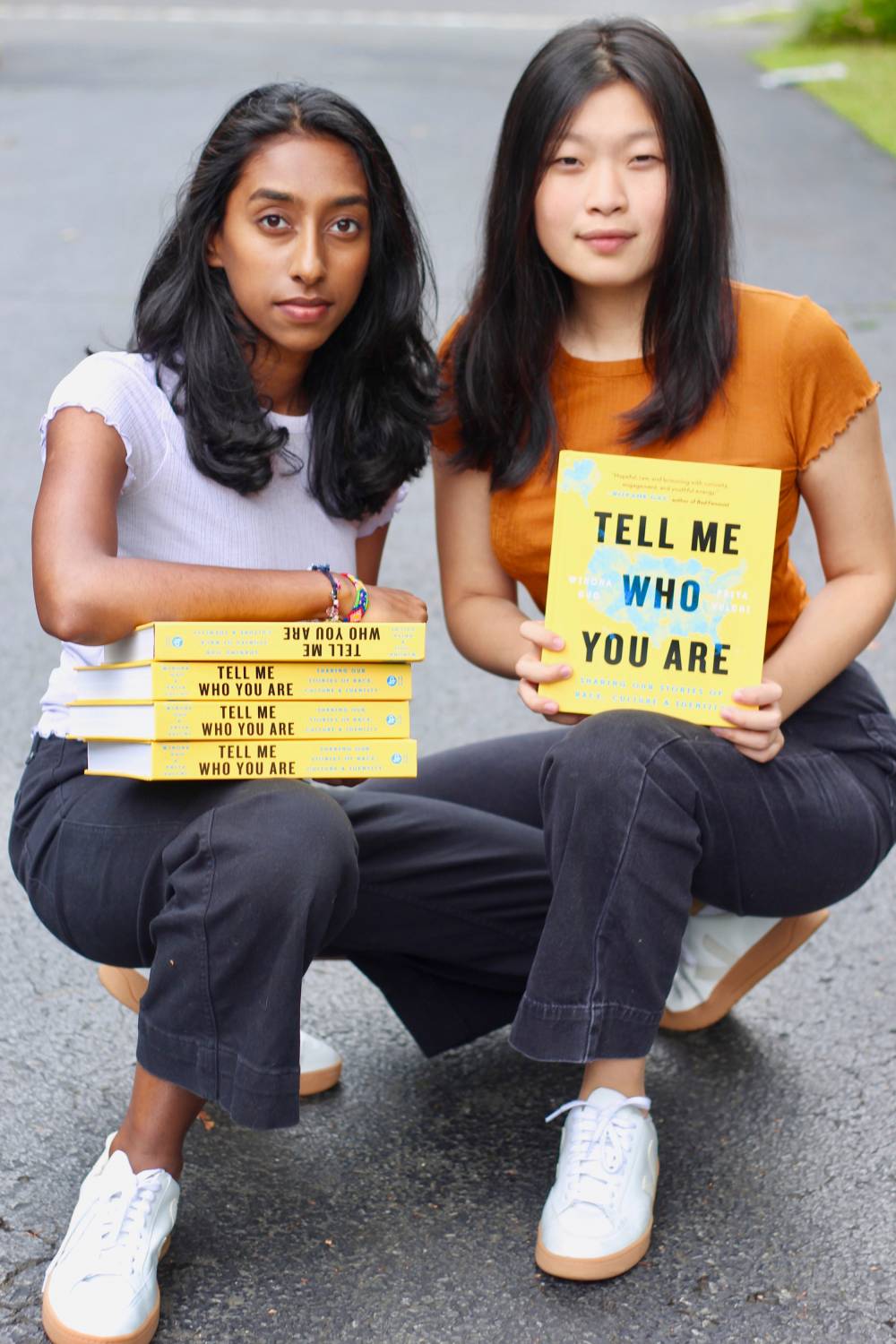 Priya Vulchi and Winona Guo with their recently published book. 