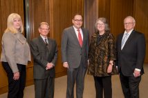 Interim Provost Marion G. Crain (left) and Chancellor Andrew D. Martin (center) recognized faculty award recipients (from left) Yoram Rudy, Fiona Marshall and Gary Stormo during a Nov. 8 ceremony in Emerson Auditorium.