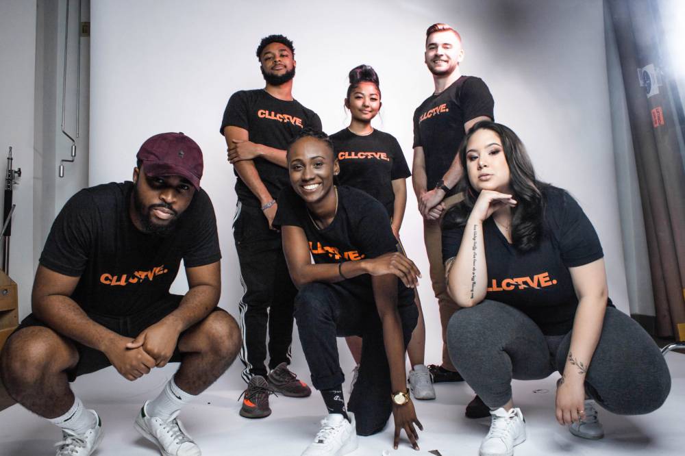 Six male and female students in black team t-shirts