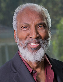 john a. powell smiling