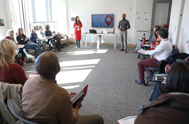 Sarah Hobson and Adam Layne of the Academy for Diversity, Equity, and Inclusion speak at the 2020 Day of Dialogue & Action. (Photo: James Byard/Washington University)