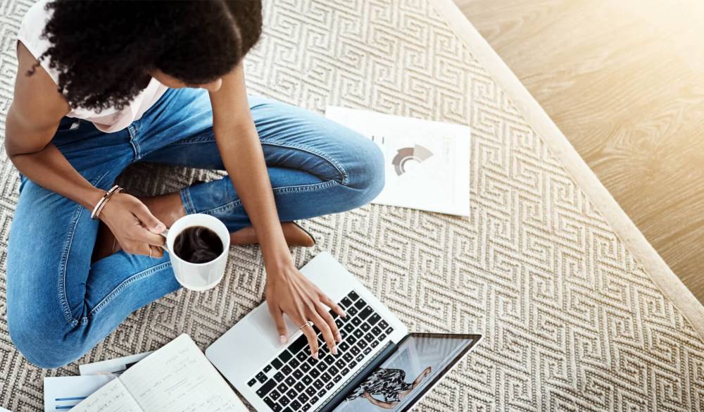 A young businesswoman working on her laptop in her home office. Credit: iStock/PeopleImages