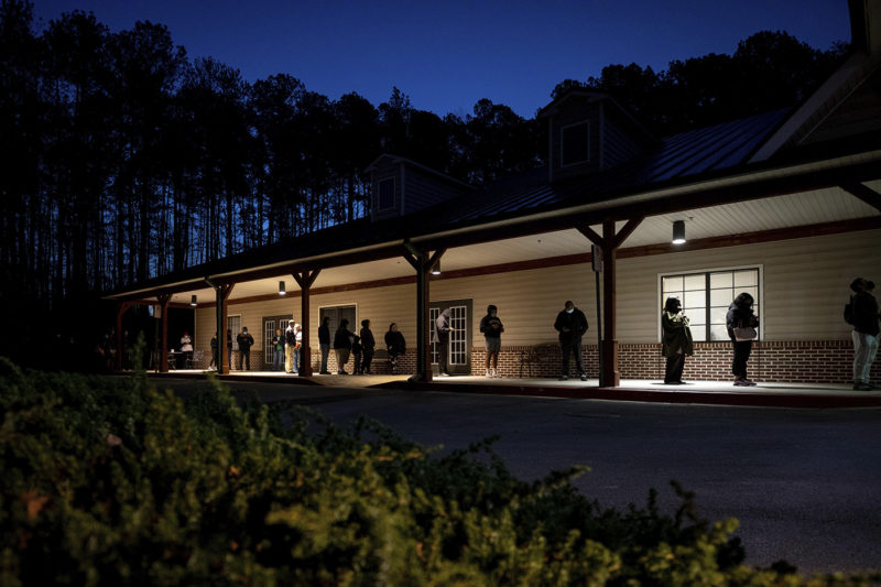 Voters wait in line to cast their ballots in Georgia's Senate runoff elections at a senior center, on Jan. 5, 2021, in Acworth, Ga. AP Photo by Branden Camp